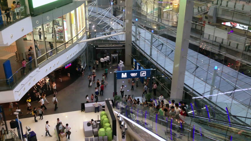 BANGKOK -  10 SEPTEMBER: People are taking escalators in the new shopping mall
