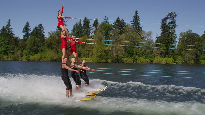 Stunt water skiers form human pyramid Royalty-Free Stock Footage #4663904