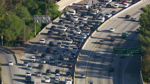 Aerial view of rush hour traffic on busy freeway Stockvideo