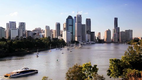 Australia - April 2012: Water taxi on Brisbane River and city skyline, Queensland, Australia in April, 2012
