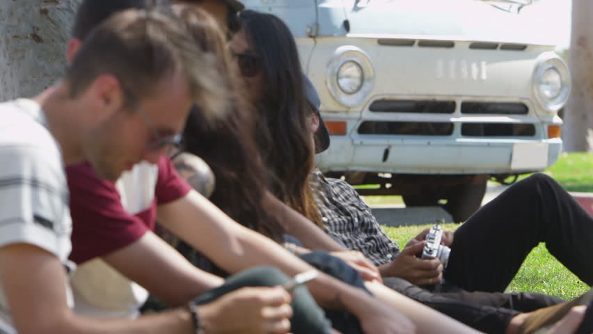Group of young people on road trip hanging out