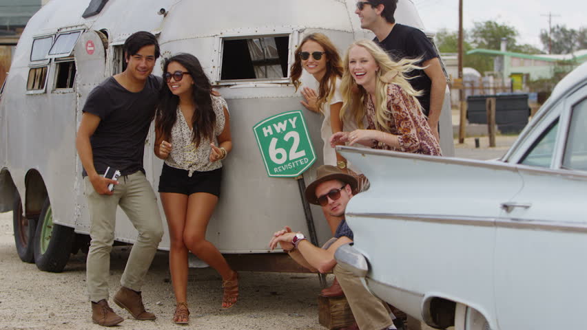 Group of young people on road trip 