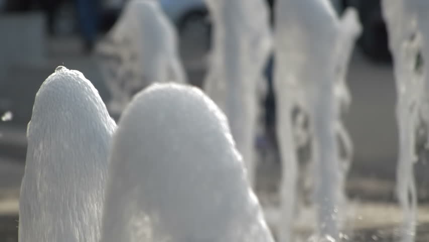 Water fountain in the center of Cluj Napoca, Romania, close up, slow motion