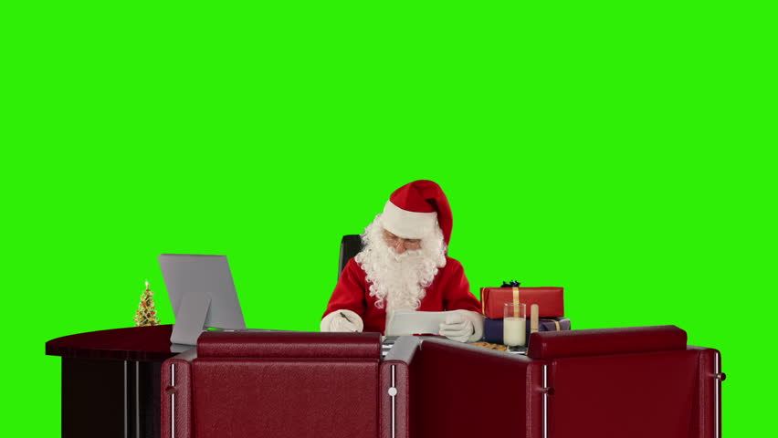 Santa Claus reading letters and sorting presents, Green Screen