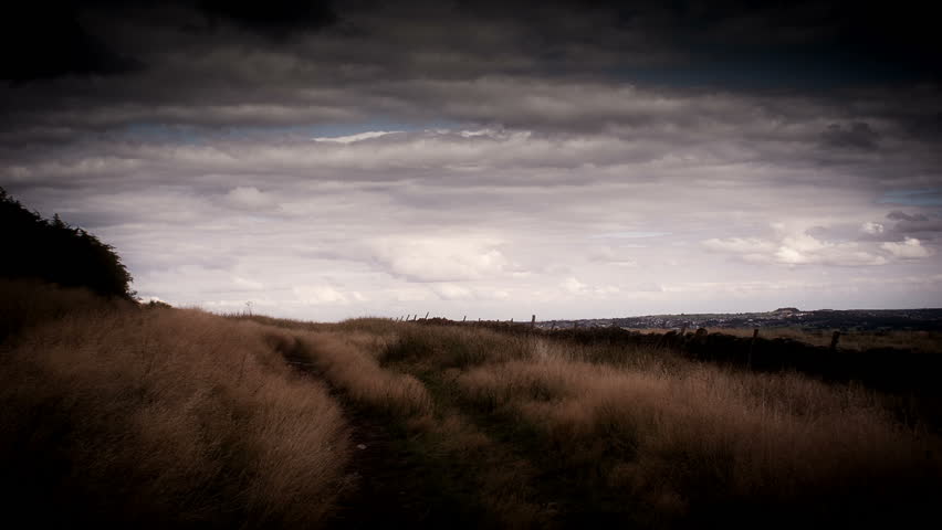 Open Moorland Set Against A Dramatic Looking Skyline In Yorkshire, England.