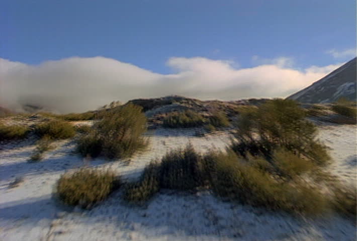 Flying over a mountain range in the Sierra Nevada.