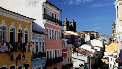 High angle street view of a cobblestone street and colorful buildings in a residential neighborhood in Pelourinho in old Salvador, Brazil