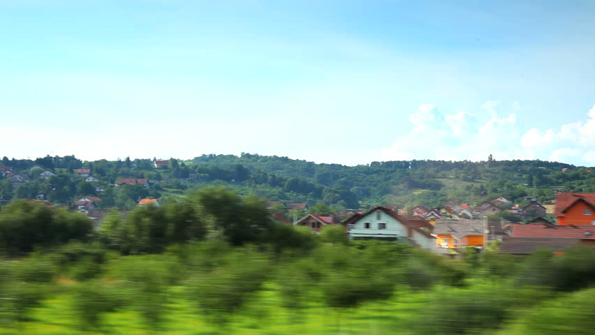 Car driving through country