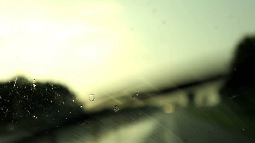 Car driving and rain drops on the glass