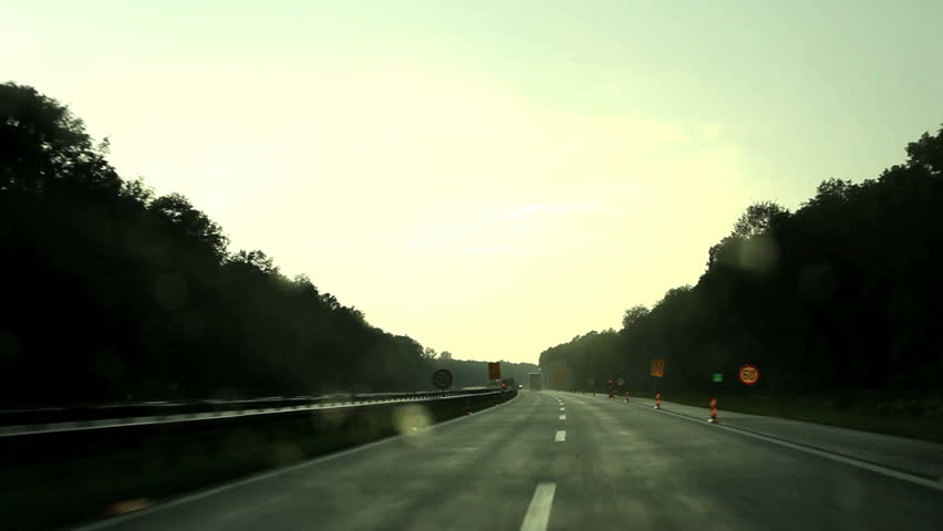 Car driving and Rain drops on the glass