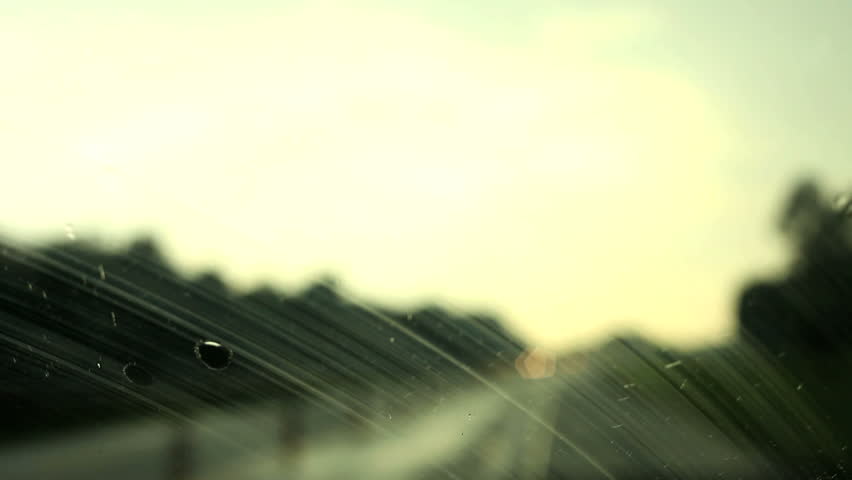 Car driving and Rain drops on the glass
