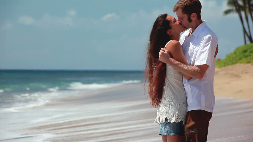 Couple Kissing On Beach With Stock Footage Video