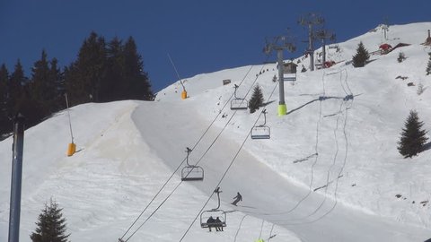 People Riding with Chairlift in Alps, Alpine View, Winter Sports, Skiing Slope