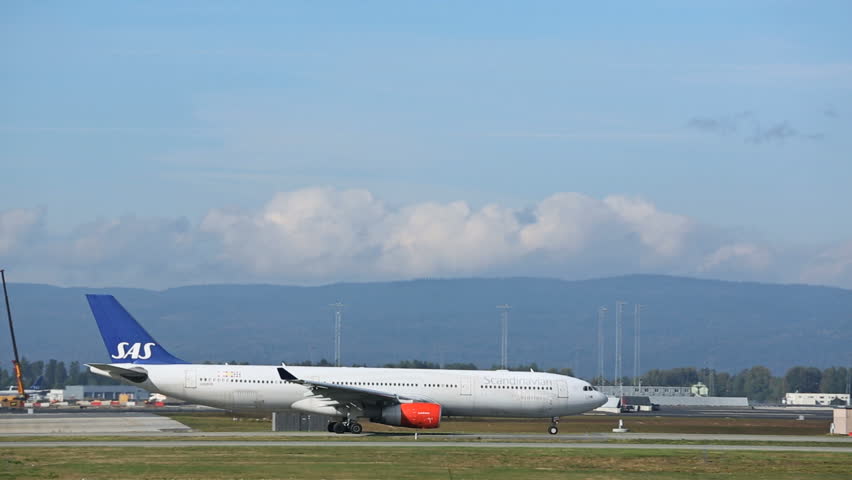 OSLO AIRPORT NORWAY FRIDAY 13 SEPTEMBER 2013: SAS Airbus A330 taxing for take