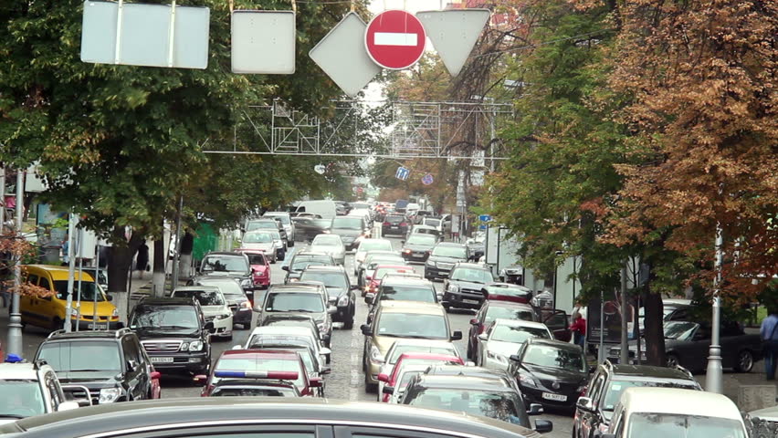 Timelapse of moving cars stuck traffic jam, large city street