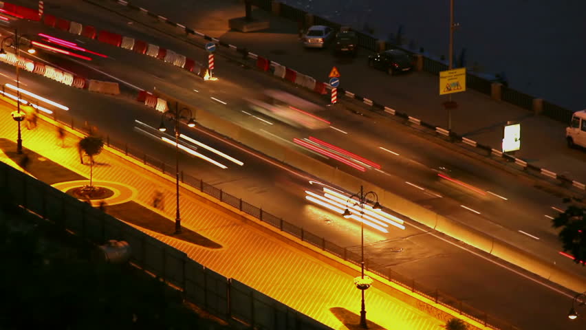 Night road timelapse cars move leave long traces, lights on