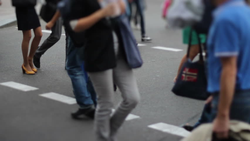 Mini city timelapse of people crowd walk on crossroad pedestrian