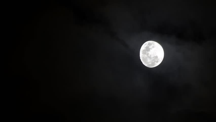 moon and clouds - Stock Video. moon and clouds flowing fast timelapse