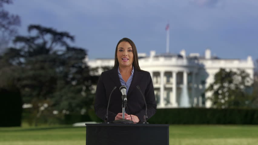 Politician speaking in front of White House