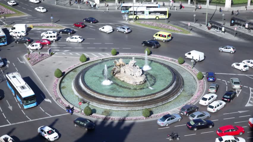 MADRID - MARCH 7: City traffic around fountain at Cebeles Square on 7 March 2012 in Madrid, Spain. Fountain was designed by Ventura Rodriguez.