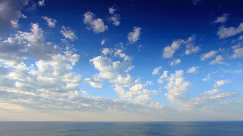 Cloudy sky over the sea (Time Lapse)
