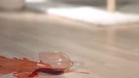 Glass of red wine falling and breaking - Powered by Shutterstock - Get 15% off with code: PIKWIZARD15