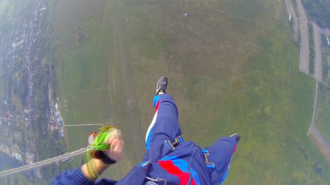 video parachute jumps (skydiving) from a first-person
video shooting process parachute opens in the first person
