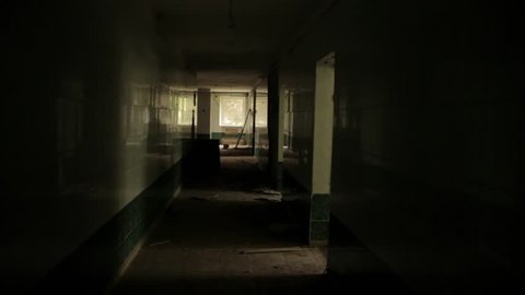 camera flying in the hallway of the abandoned house. POV, steadycam