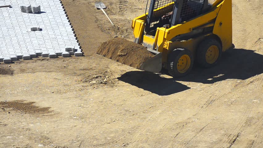 Construction Site - Stock Video. Gravel and dirt being moved around on a