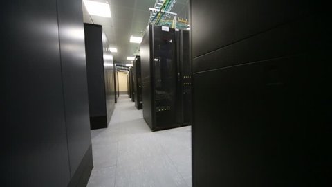 Room of data center with telecommunication racks and cables