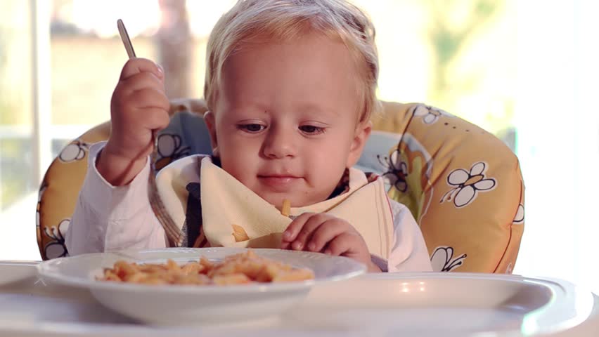 funny baby eating