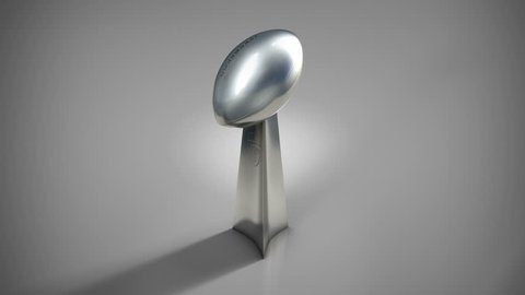 American football silver trophy with move from high to low