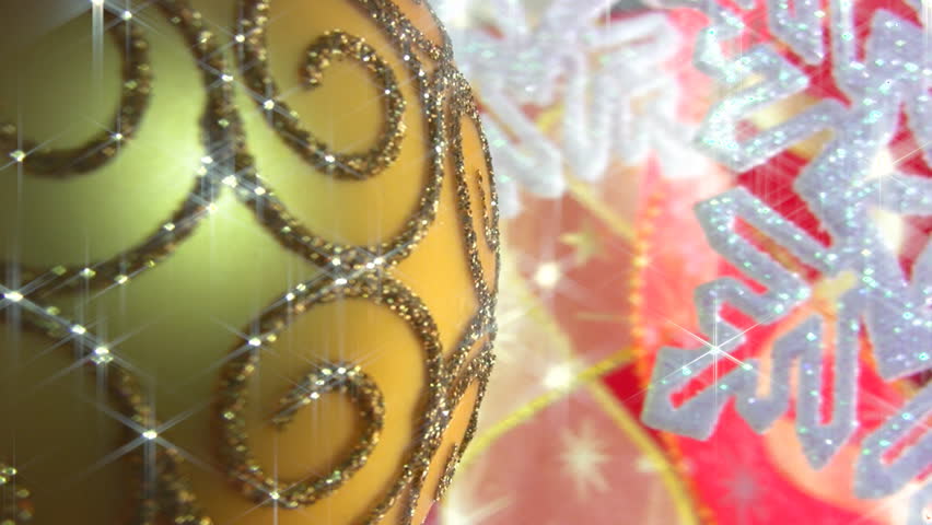Gold Christmas ball handmade shimmering sparks against the backdrop of bright