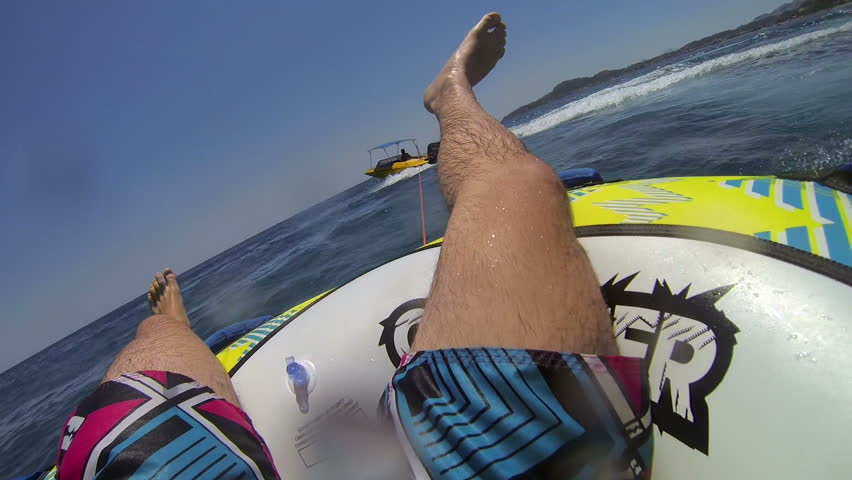 Tube riding behind the boat on Rodos