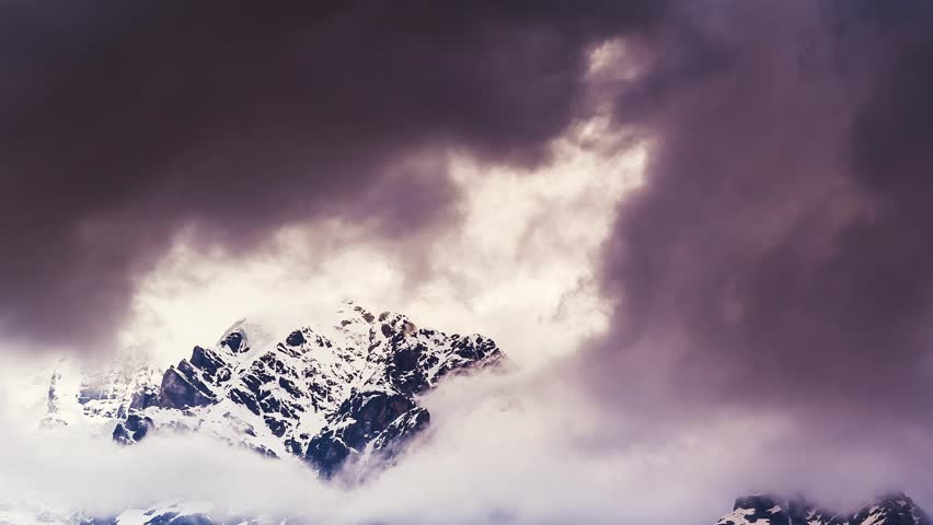 Time lapse clip. Dramatic sky at the foot of  Tetnuldi glacier. Upper Svaneti,
