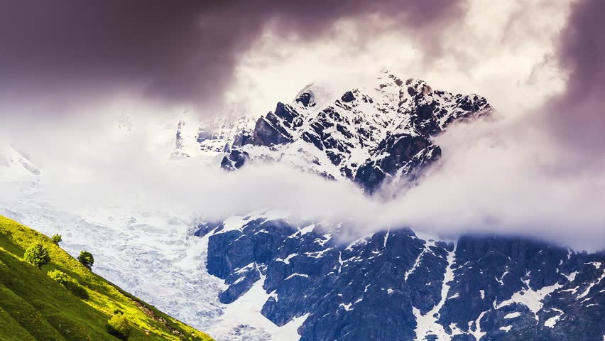 Time lapse clip. Dramatic sky at the foot of  Tetnuldi glacier. Upper Svaneti,