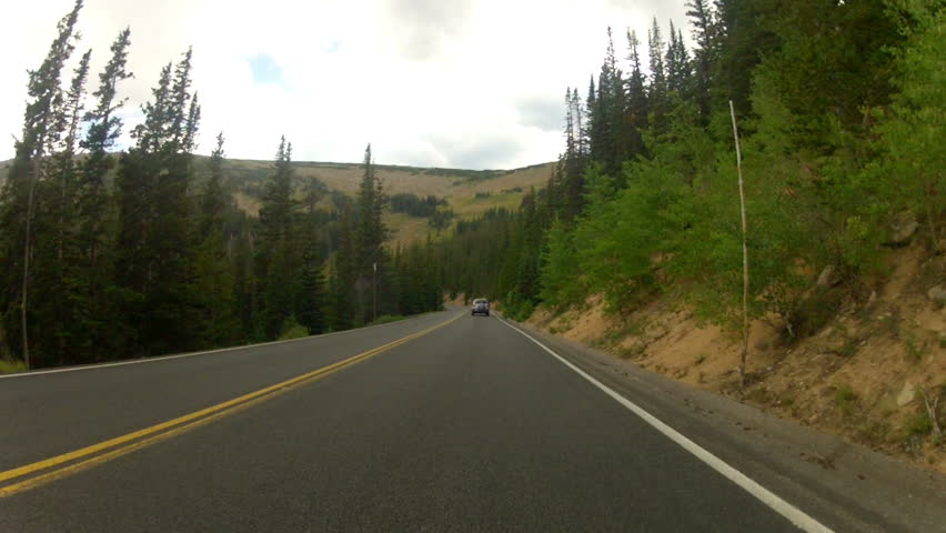 Roadway into the Mountains at Rocky Mountains National Park, Colorado ...