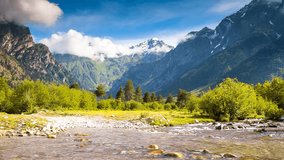 Time lapse clip. River in mountain valley at the foot of  Mt. Ushba. Upper Svaneti, Georgia, Europe. Caucasus mountains. Beauty world. HD video (High Definition)