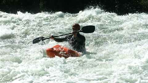 Kayaking in white water, super slow motion Video stock