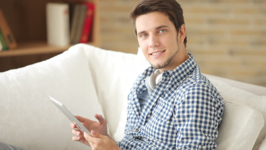 Good Looking Guy Sitting On Sofa Stock Footage Video 100 Royalty Free Shutterstock