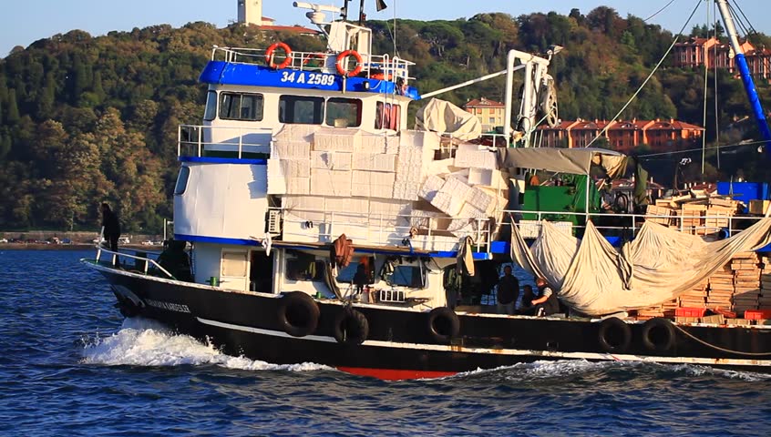 ISTANBUL - OCT 22: Fishing boat on the way to open sea on October 22, 2012 in