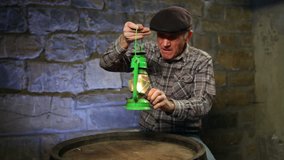 Elderly man lighting an old oil lamp and leaving the frame. - Powered by Shutterstock - Get 15% off with code: PIKWIZARD15