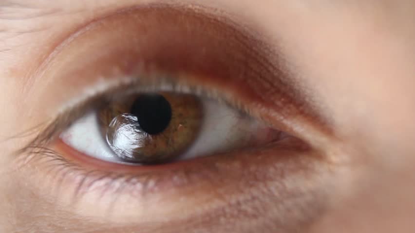 Eye Blinks Macro. Macro shot of a blinking eye of young adult. Royalty-Free Stock Footage #4738511