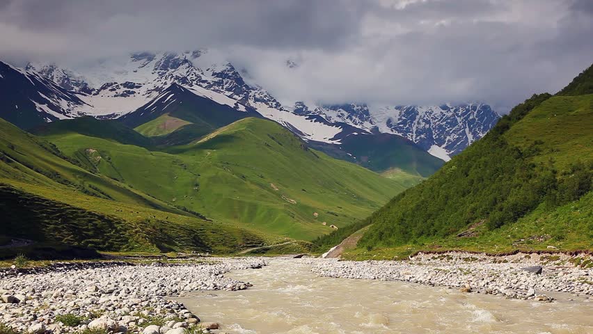River in mountain valley at the foot of  Mt. Shkhara. Upper Svaneti, Georgia,