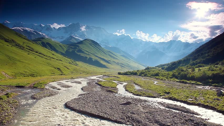 River in mountain valley at the foot of  Mt. Shkhara. Upper Svaneti, Georgia,