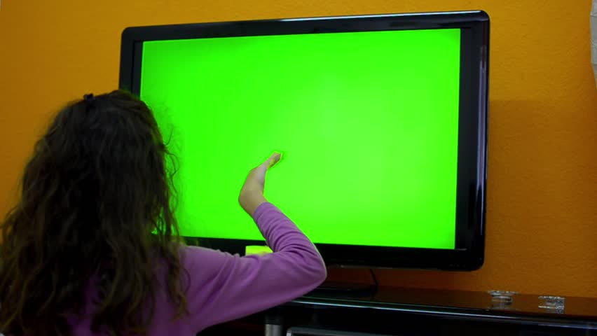 Girl do smart TV touchless gestures dolly shoot right to left, 1080. showing the