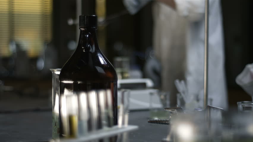 Close up shot of chemistry equipment set up on a laboratory table