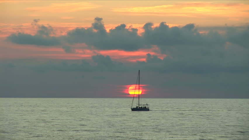 beautiful sunset on the black sea. During a sunset the boat floats