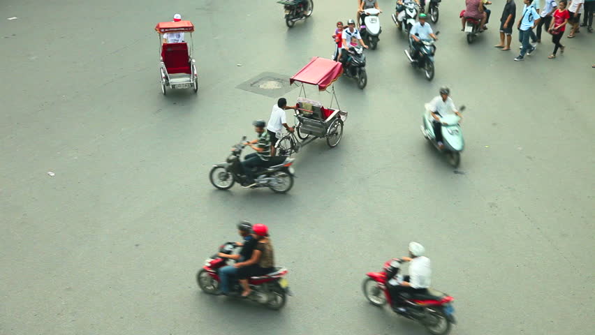 HANOI - 17 SEPTEMBER: Timelapse view of people and traffic in Hoan Kiem district