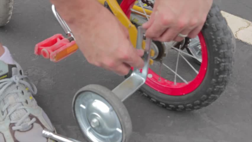 putting training wheels on a bike